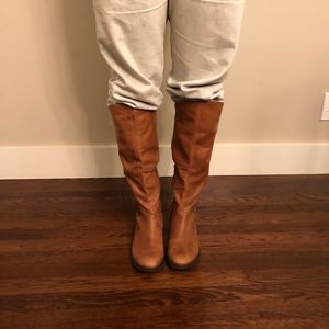 Knee high brown leather boots